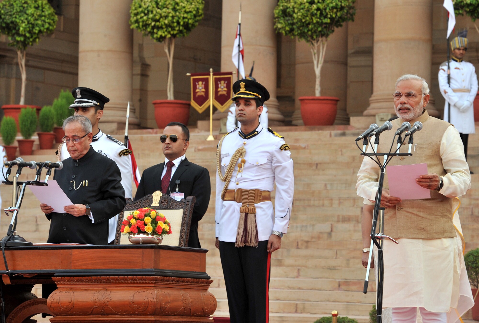 President Pranab Mukherjee administers the oath of office of Prime Minister to Narendra Modi, in New Delhi, on May 26, 2014. (Photograph: PIB)<a href=