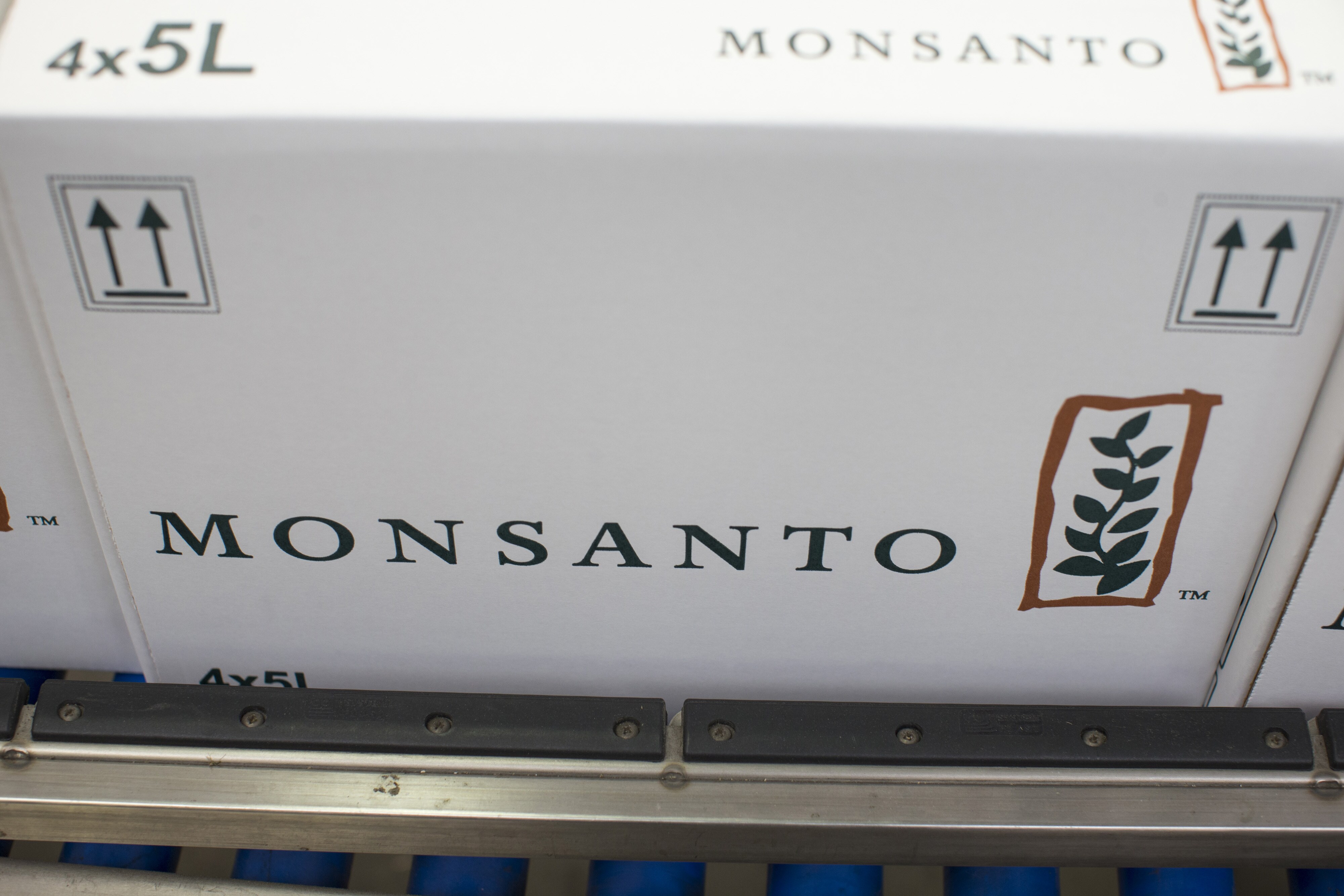 Boxes of Monsanto's products at a manufacturing and packaging facility. (Photographer: Jasper Juinen/Bloomberg)