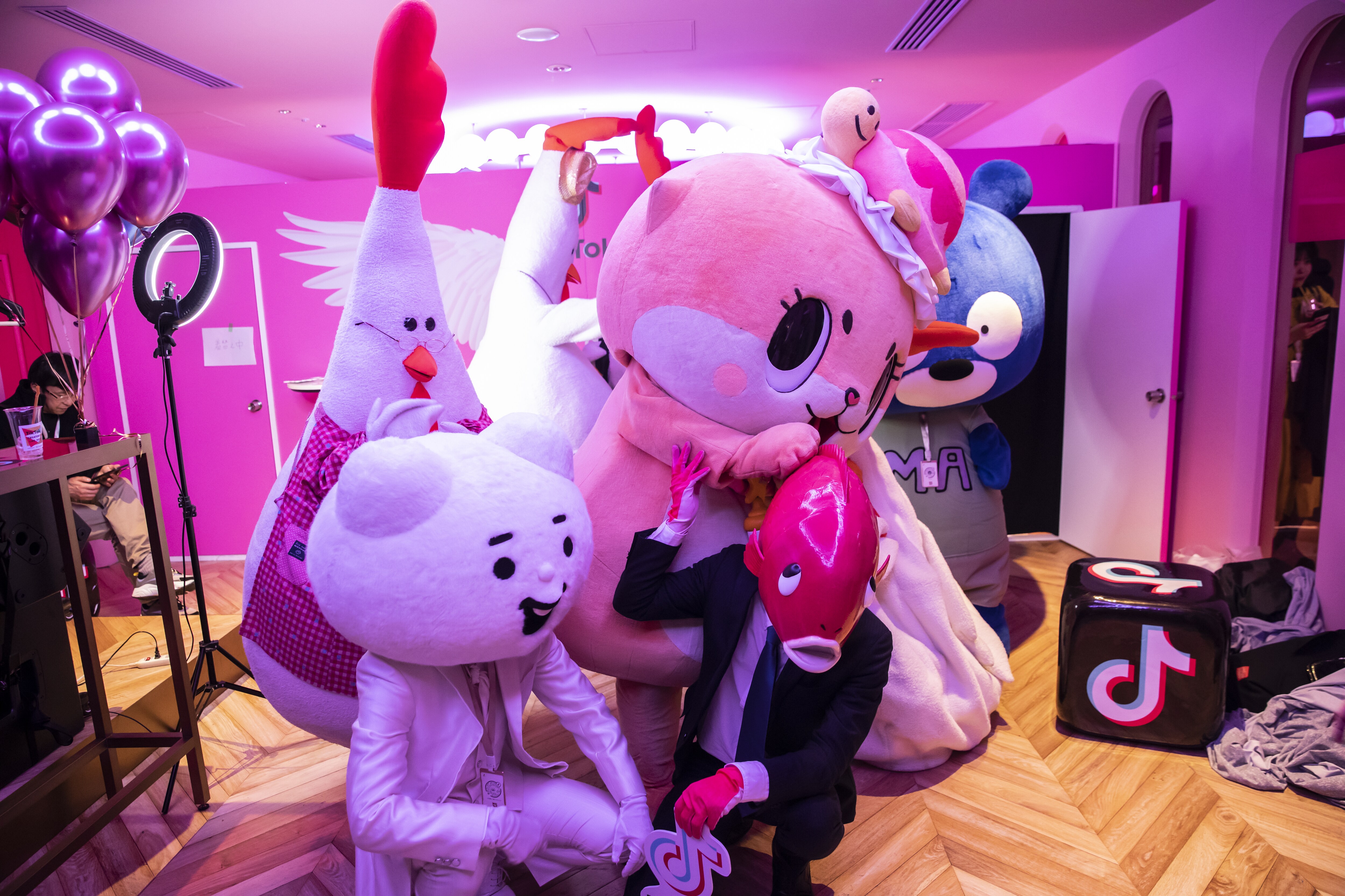 People dressed in costumes pose for photographs during the TikTok Creator's Lab 2019 event hosted by Bytedance Ltd. in Tokyo, Japan (Photographer: Shiho Fukada/Bloomberg)
