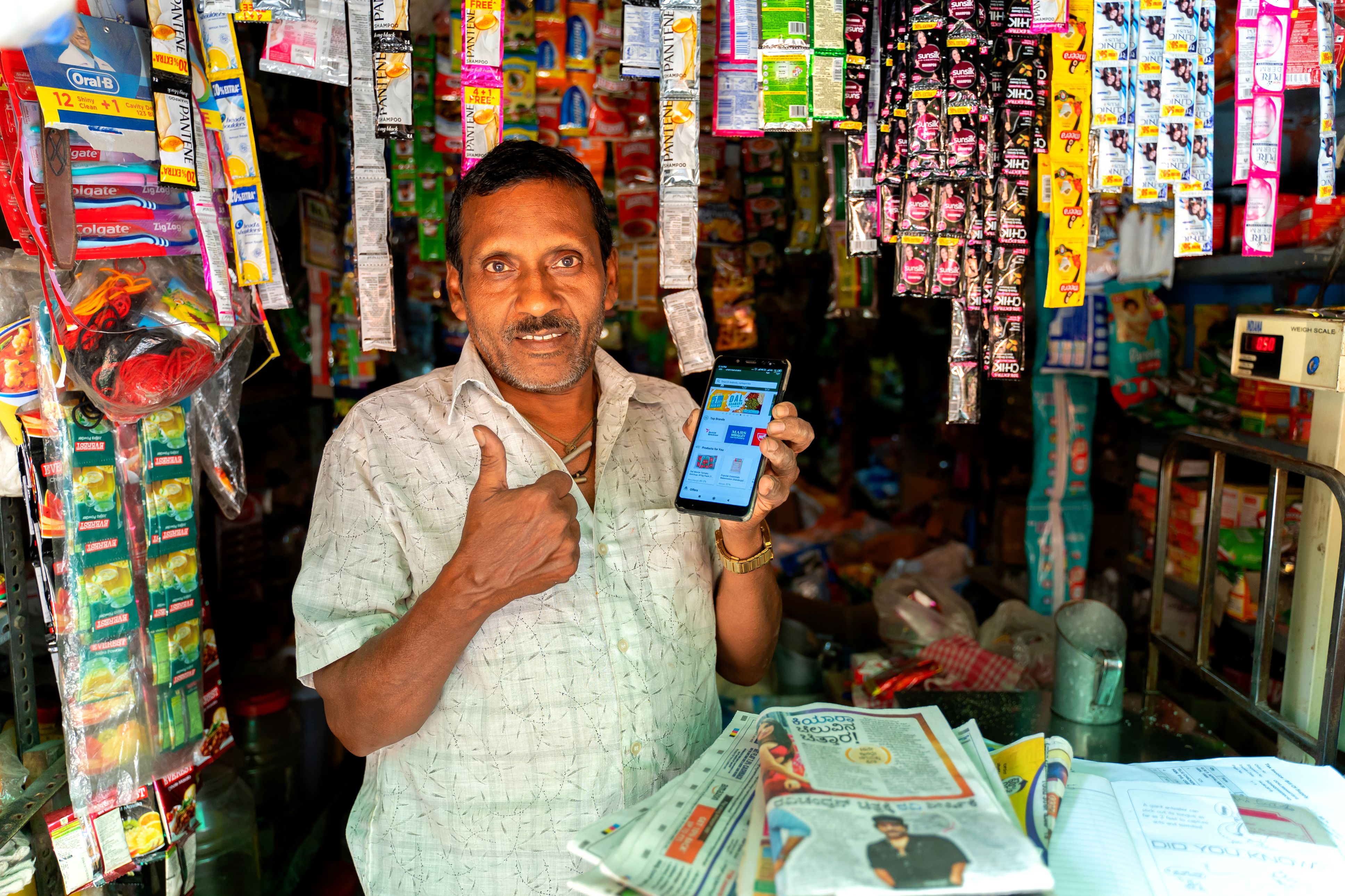 A kirana store owner using the Jumbotail application. (Source: Jumbotail)