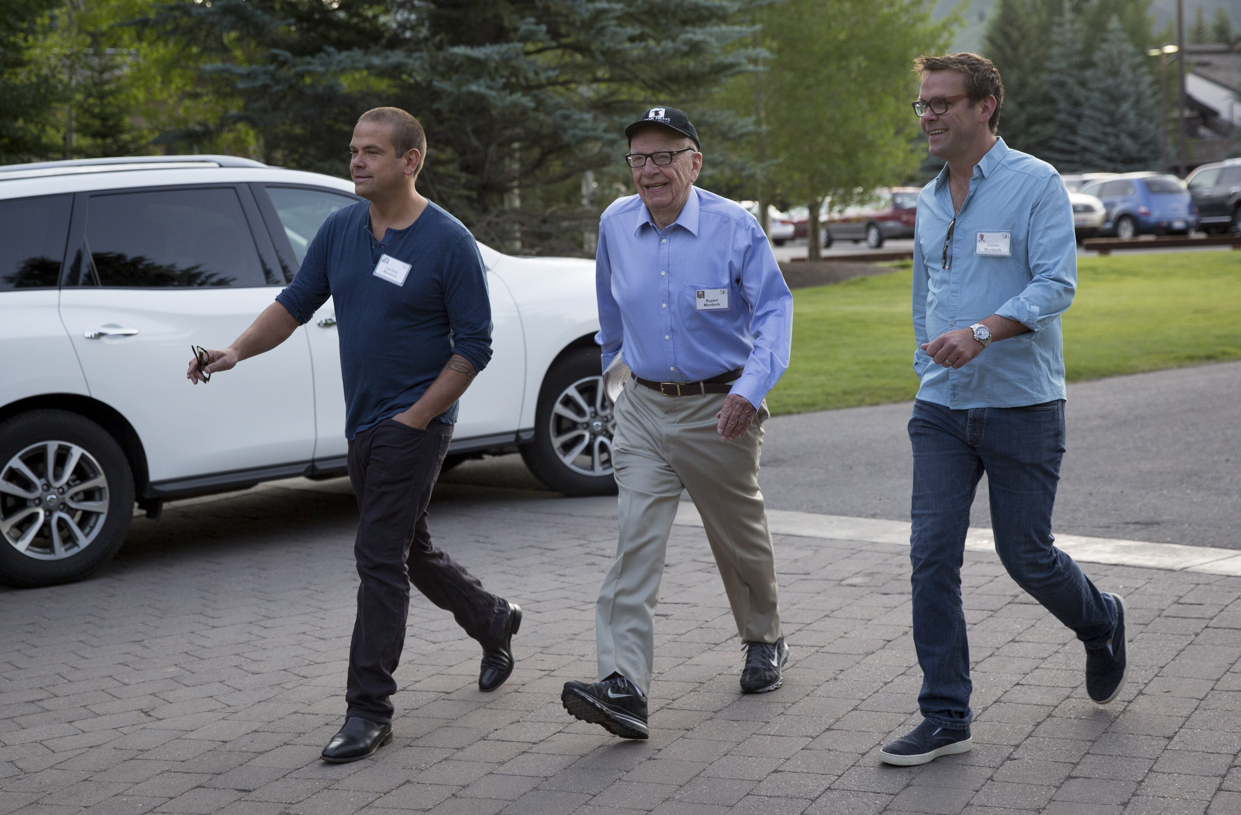 A 2013 photograph of Rupert Murdoch with his sons Lachlan and James Murdoch. (Photographer: Scott Eells/Bloomberg)