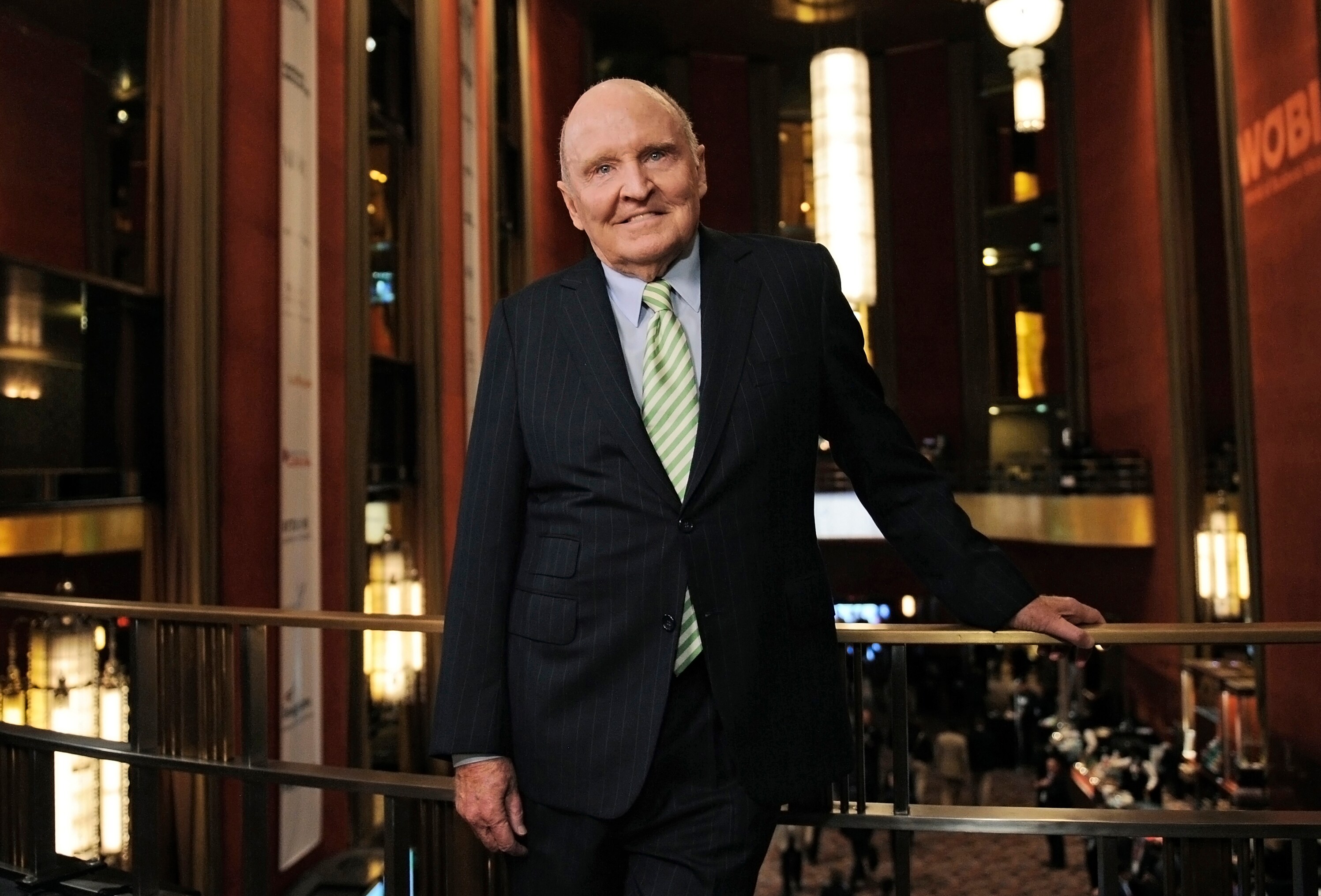 Jack Welch, former chief executive officer of General Electric Co., stands for a photograph at the World Business Forum. (Photographer: Peter Foley/Bloomberg)