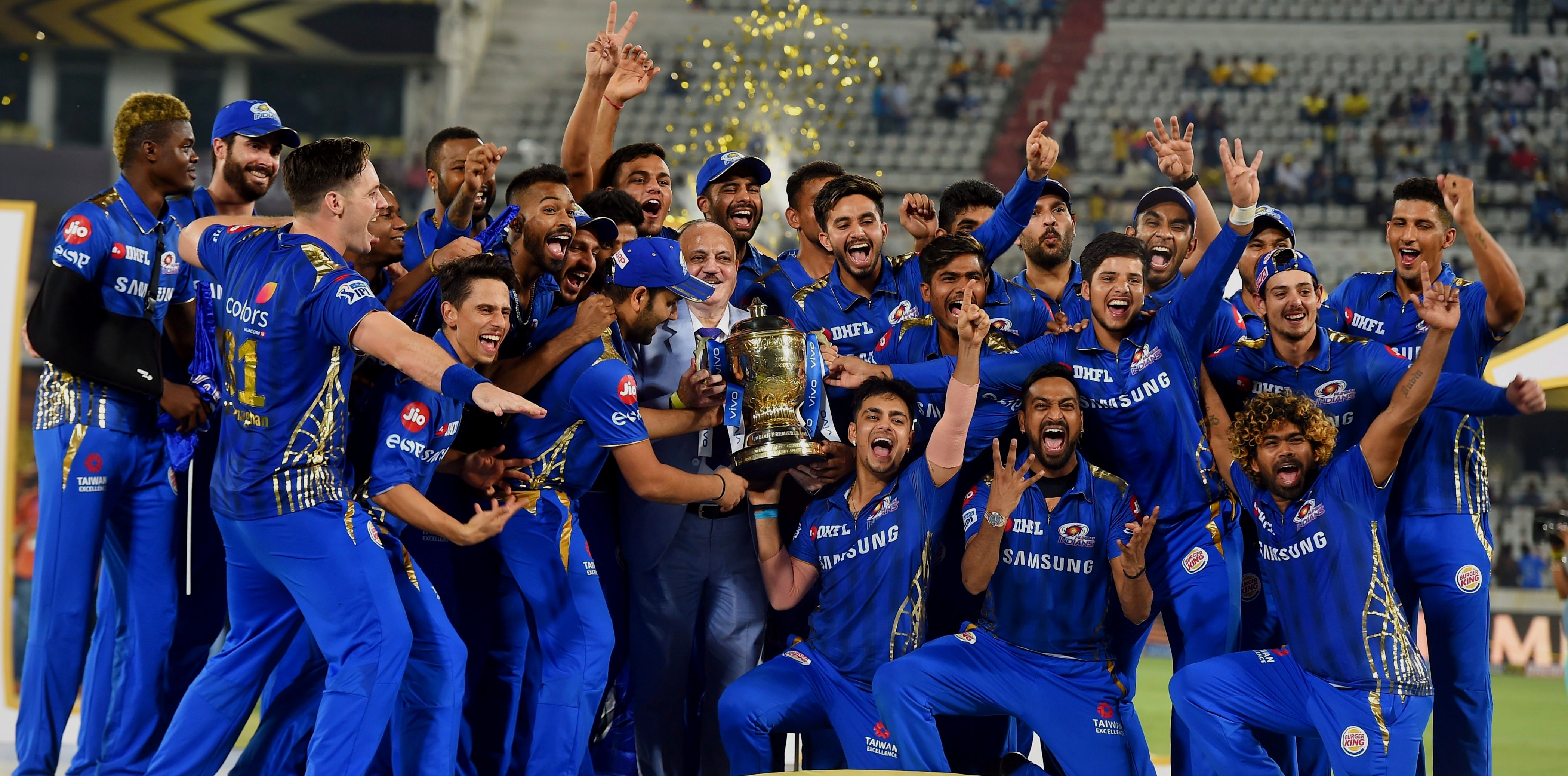 Mumbai Indians players celebrate with the IPL 2019 trophy after winning the final match against Chennai Super Kings CSK (Source: PTI)