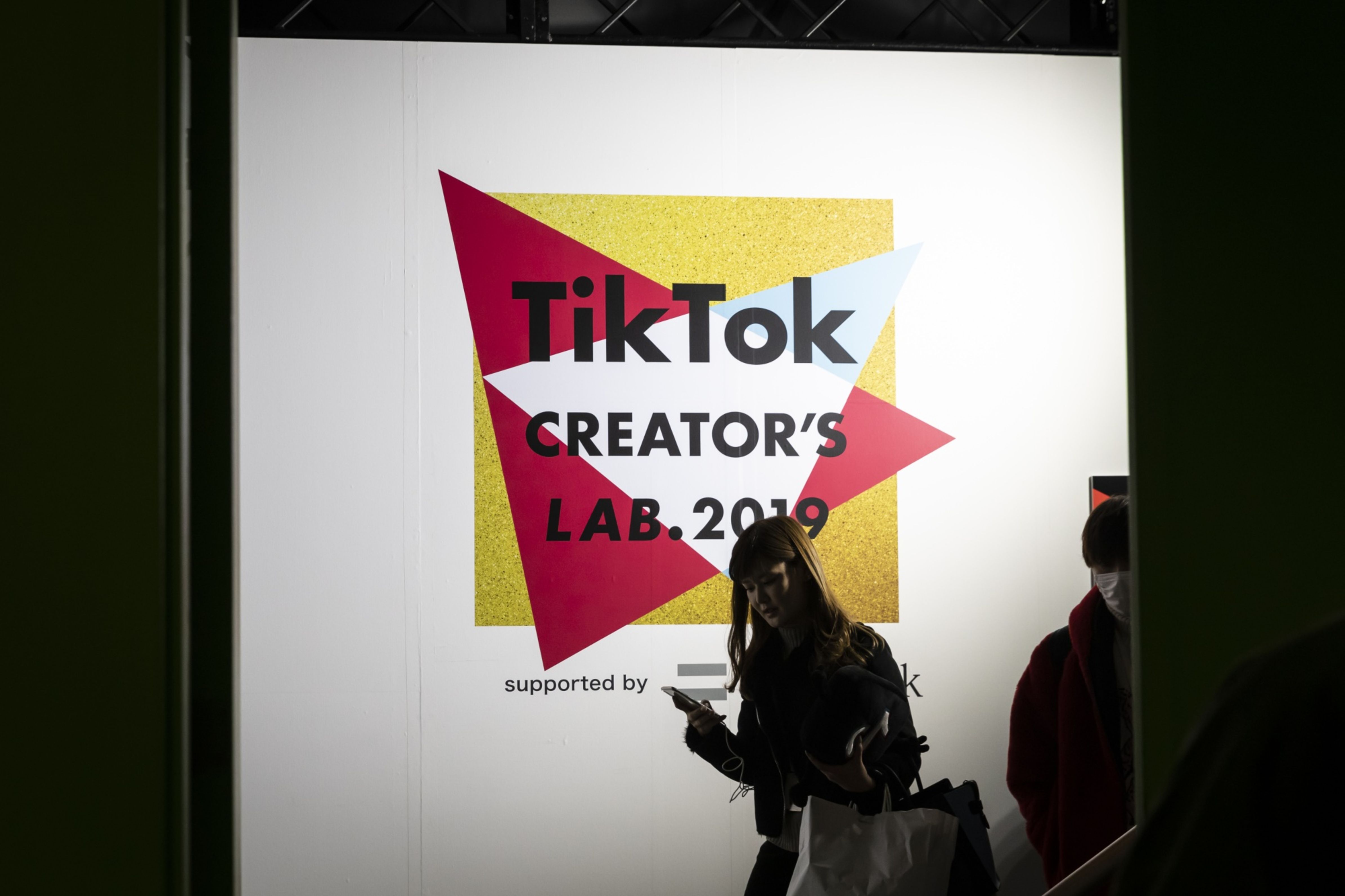 Signage is displayed at the TikTok Creator's Lab 2019 event hosted by Bytedance Ltd. in Tokyo, Japan. (Photographer: Shiho Fukada/Bloomberg)