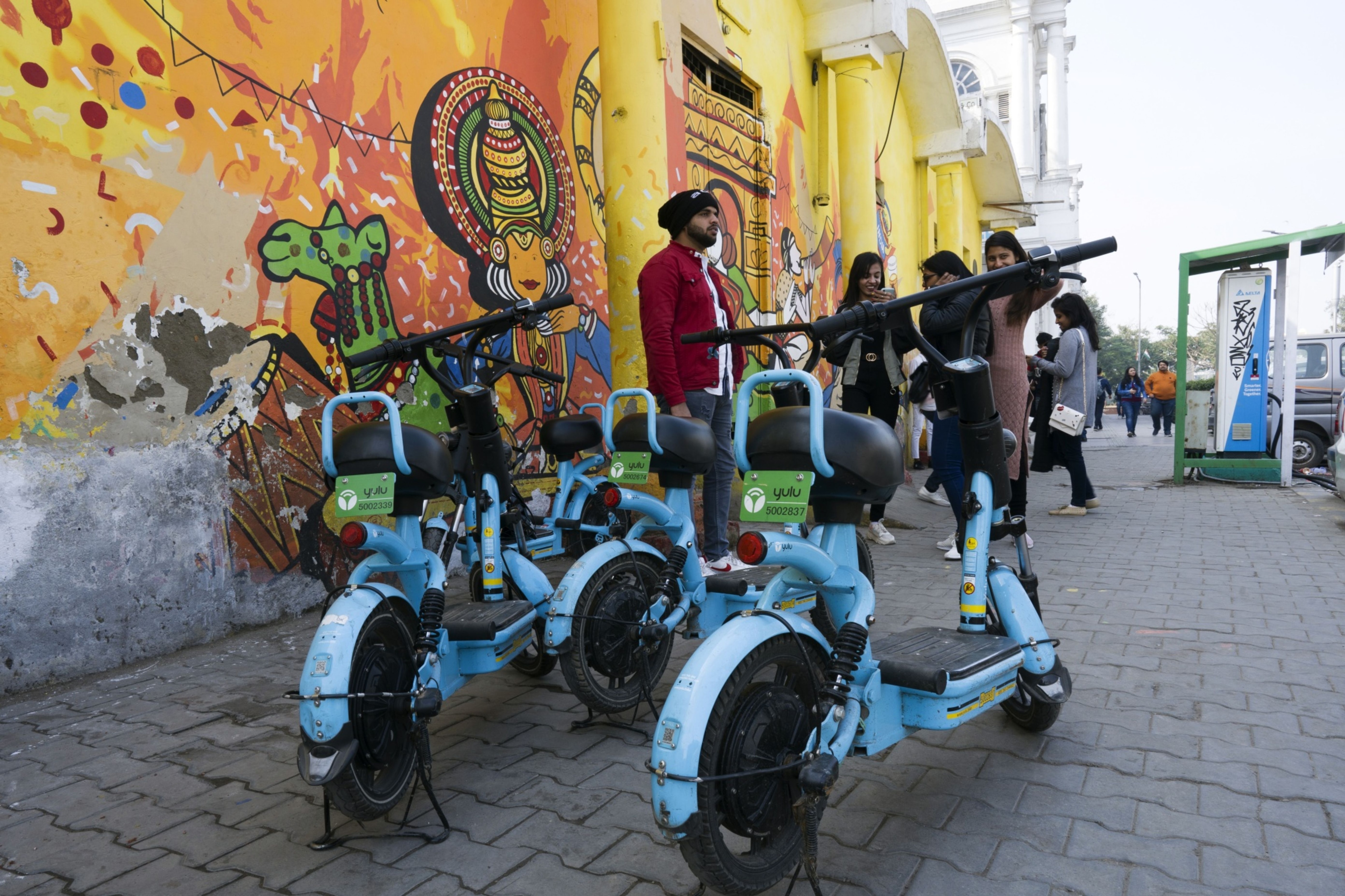 Yulu Bikes Pvt. ride-sharing bicycles stand parked at Connaught Place in New Delhi. Photographer: Ruhani Kaur/Bloomberg