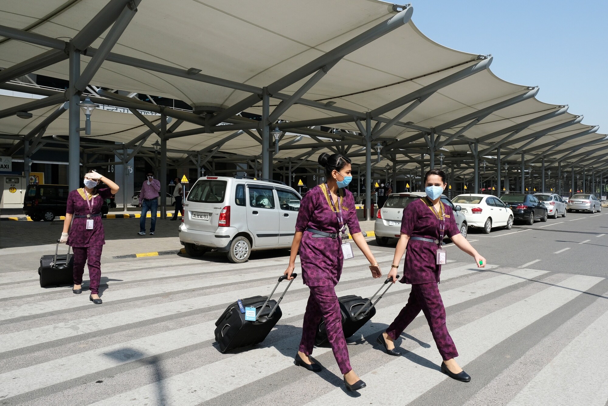 Vistara Airways flight crew outside the Indira Gandhi International Airport in New Delhi.Photographer: T. Narayan/Bloomberg