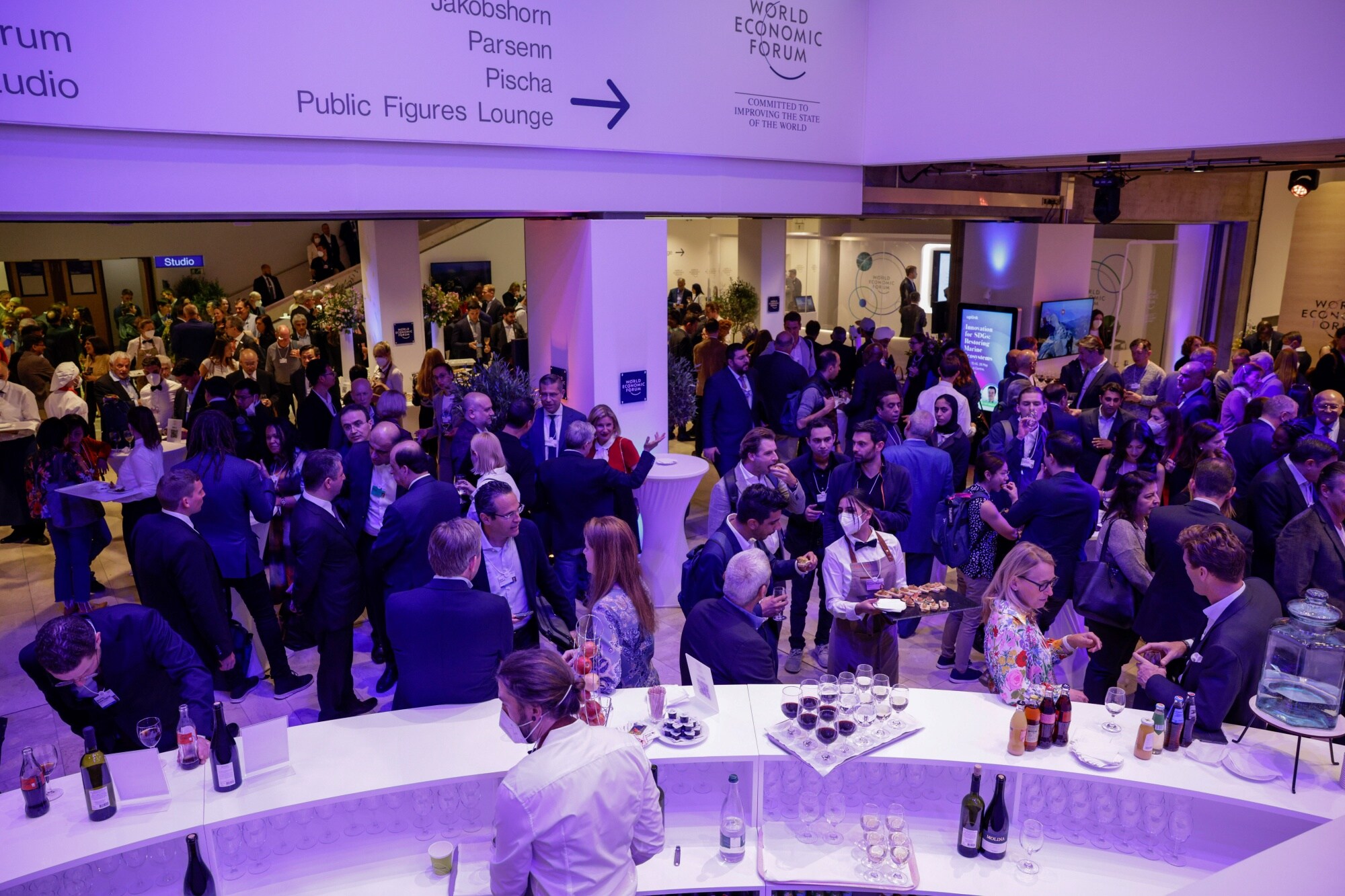 Attendees at the Welcome Reception ahead of the World Economic Forum in Davos, Switzerland.Photographer: Jason Alden/Bloomberg