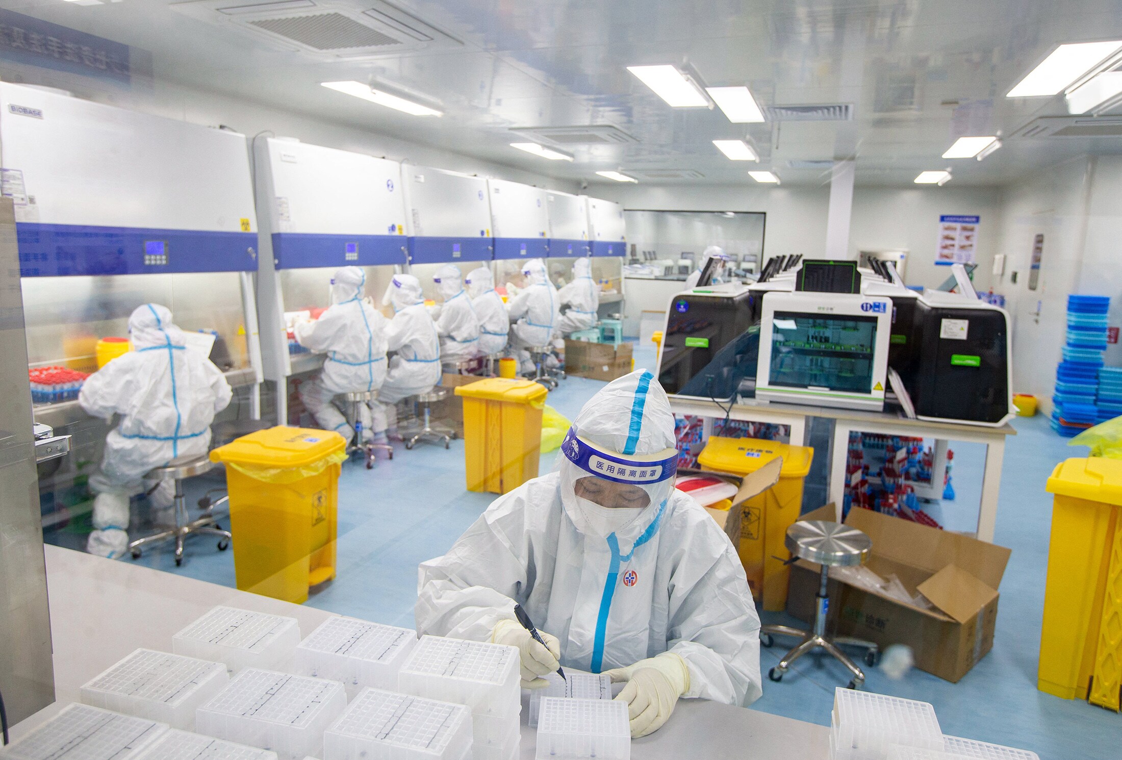 Technicians at a Covid-19 testing laboratory in Haian on April 27.Source: AFP/Getty Images