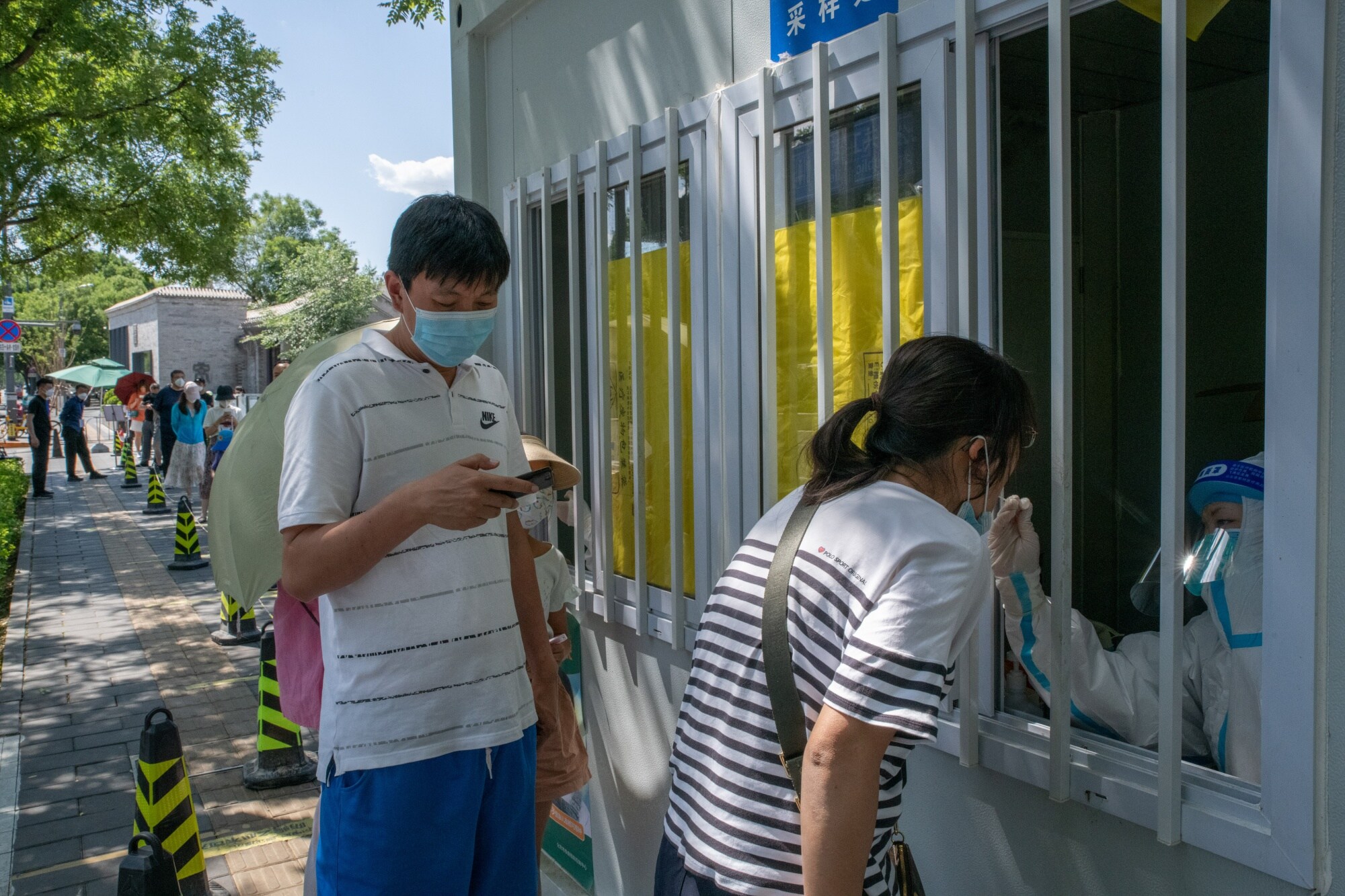 A testing booth in Beijing on May 30.Source: Bloomberg