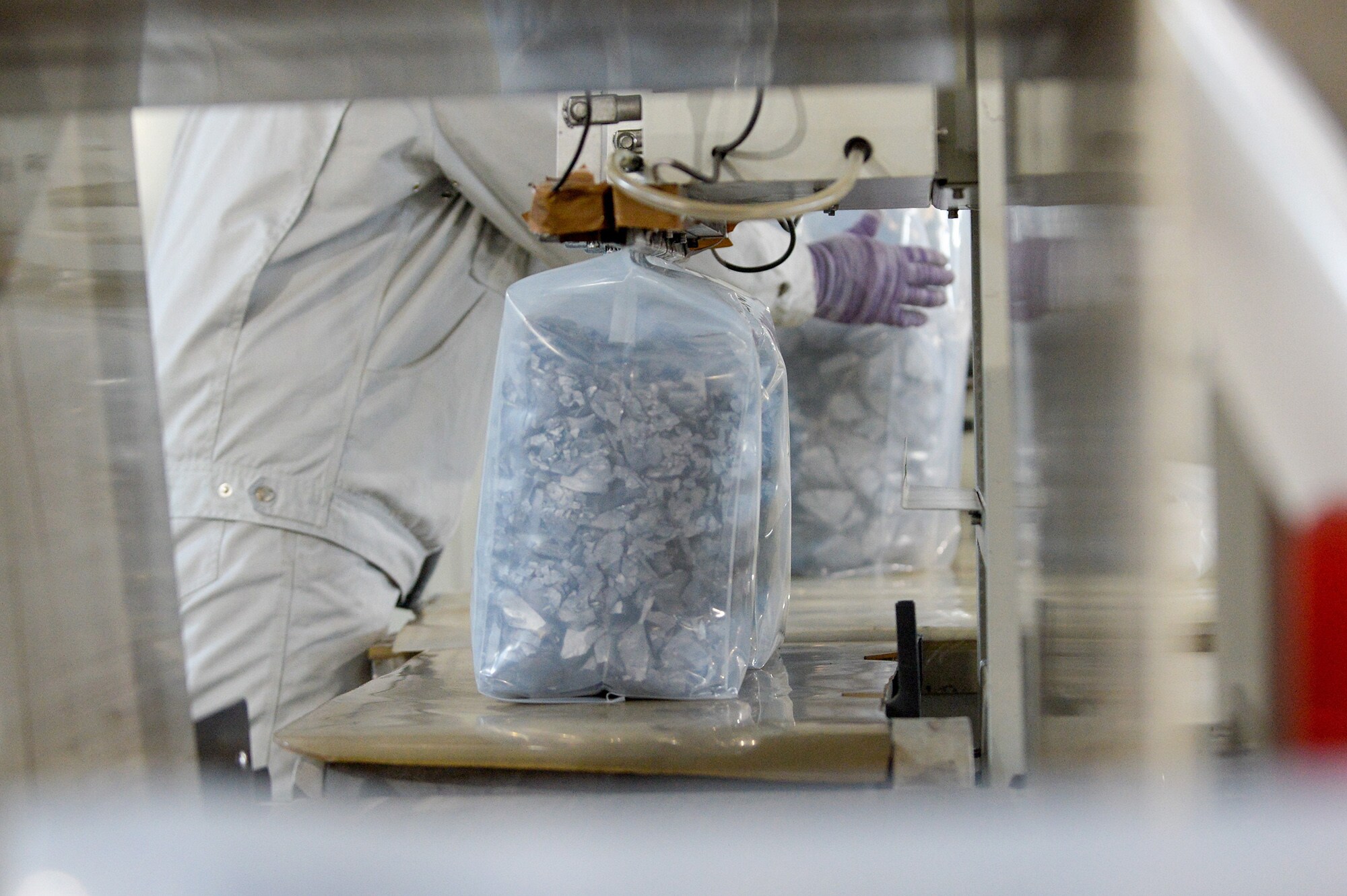 Products are packaged at a polysilicon company in northwest China's Xinjiang region.Photographer: Gao Han/Xinhua/Getty Images