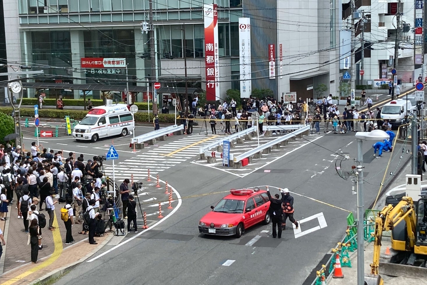 Police officers at the scene where Shinzo Abe was shot during a political event in Nara on July 8.Photographer: Kosuke Okahara/Bloomberg