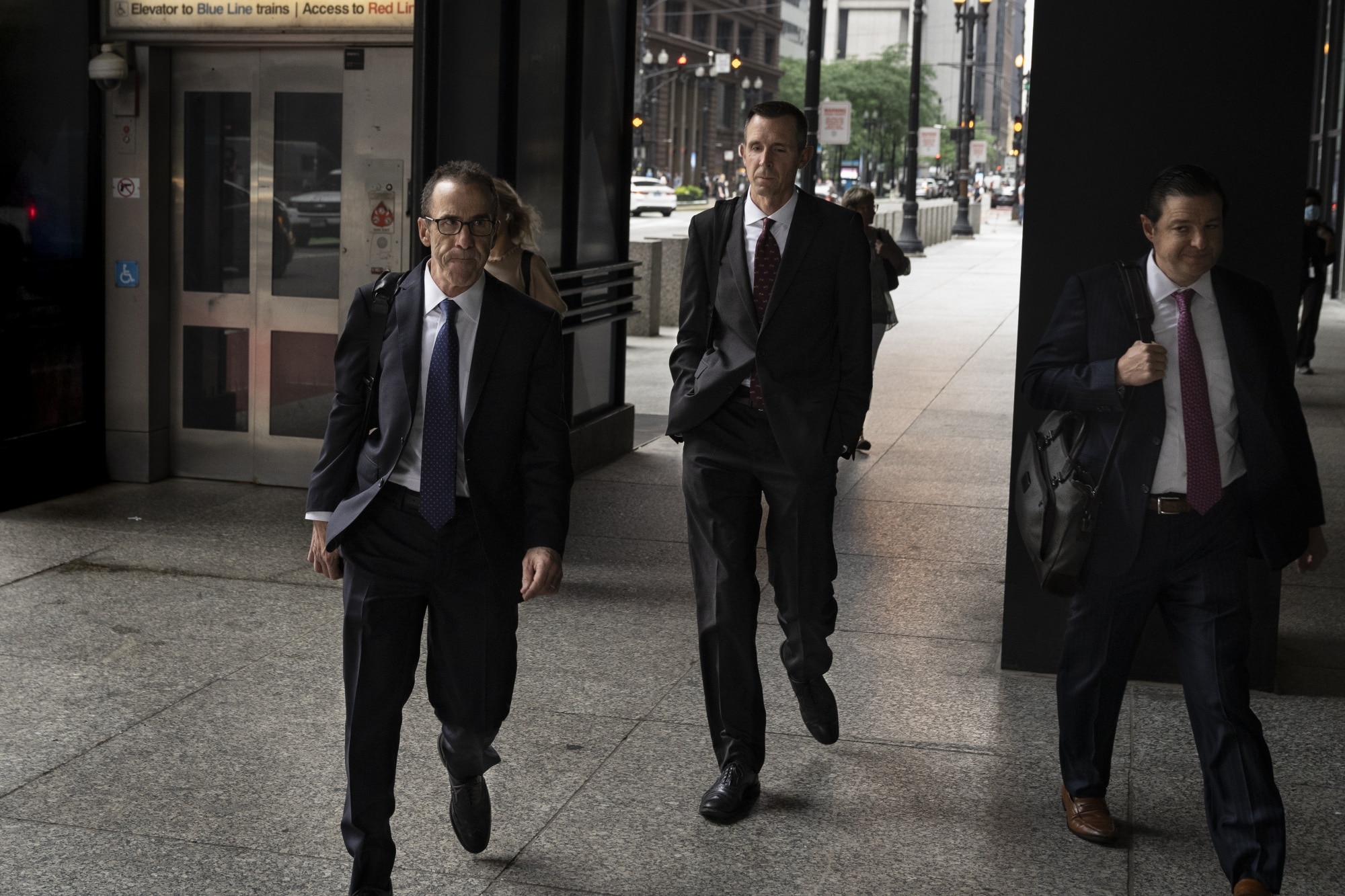 Michael Nowak, center, arrives at federal court in Chicago on July 8.Photographer: Cheney Orr/Bloomberg