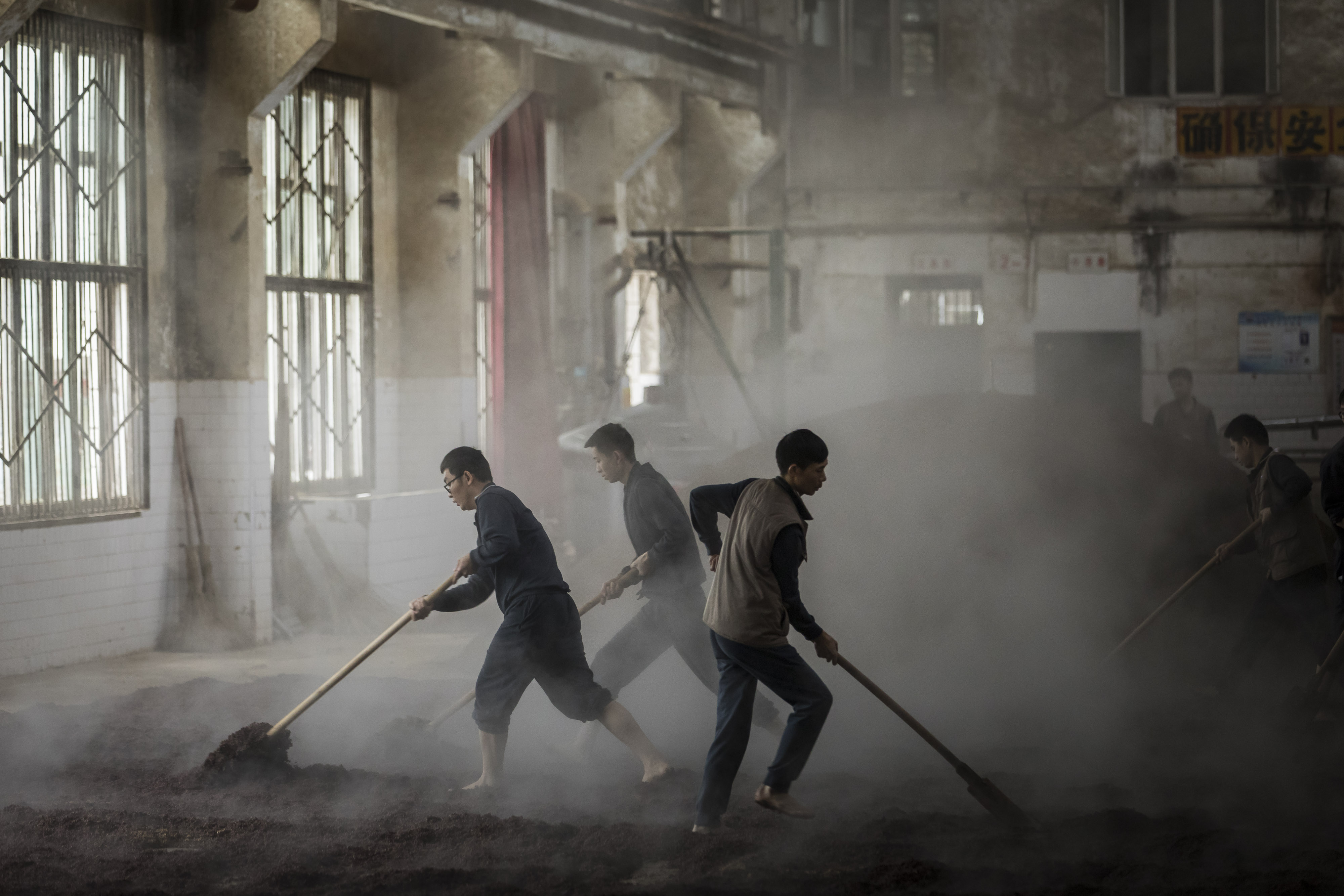 Workers at a Kweichow Moutai distillery in Guizhou province. Moutai, with its rural employment initiatives, is a top holding in the CSI 300 ESG Leaders Index.Photographer: Qilai Shen/Bloomberg