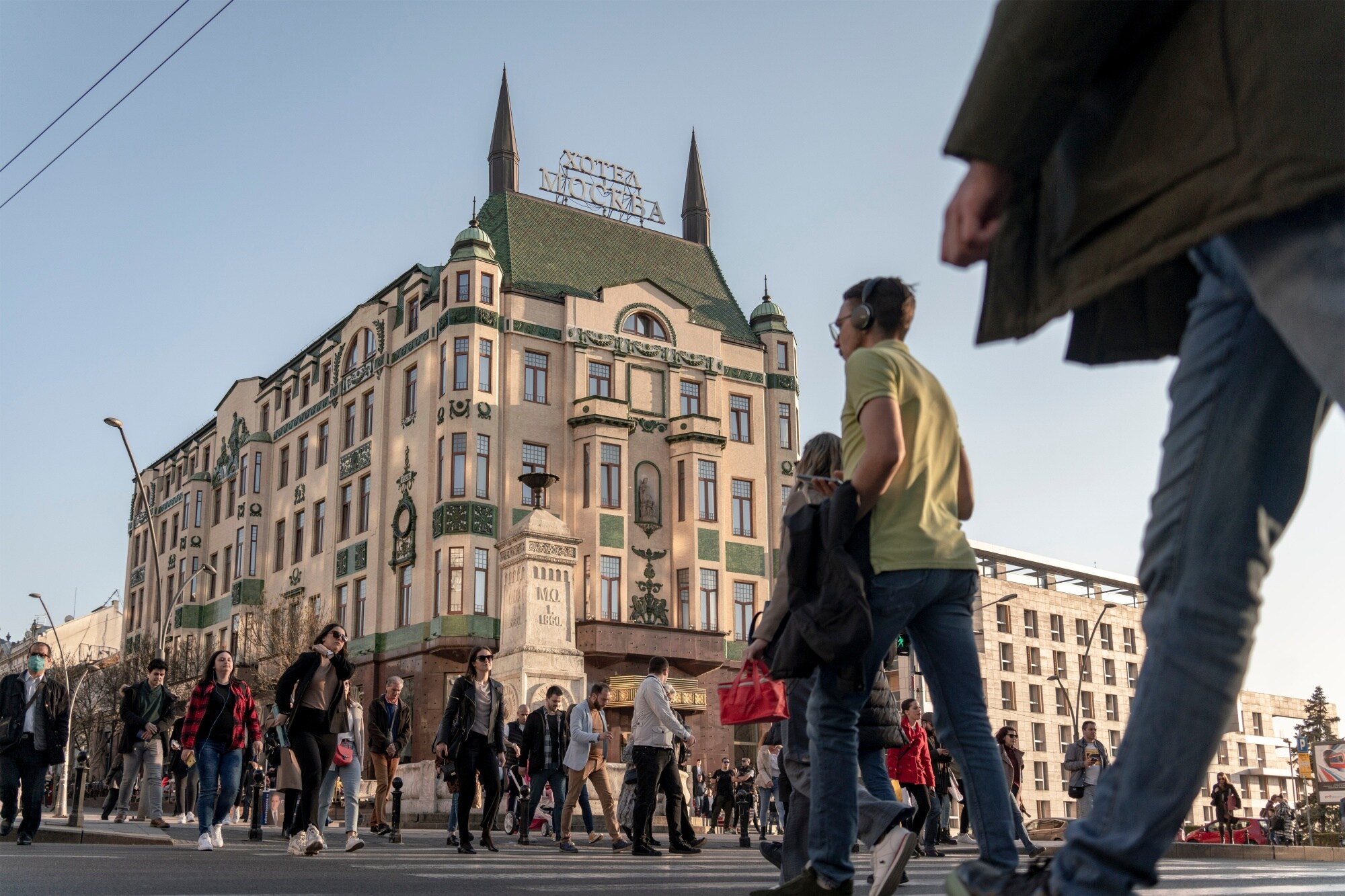 A busy pedestrian crossing outside the Hotel Moskva in March.Photographer: Oliver Bunic/Bloomberg
