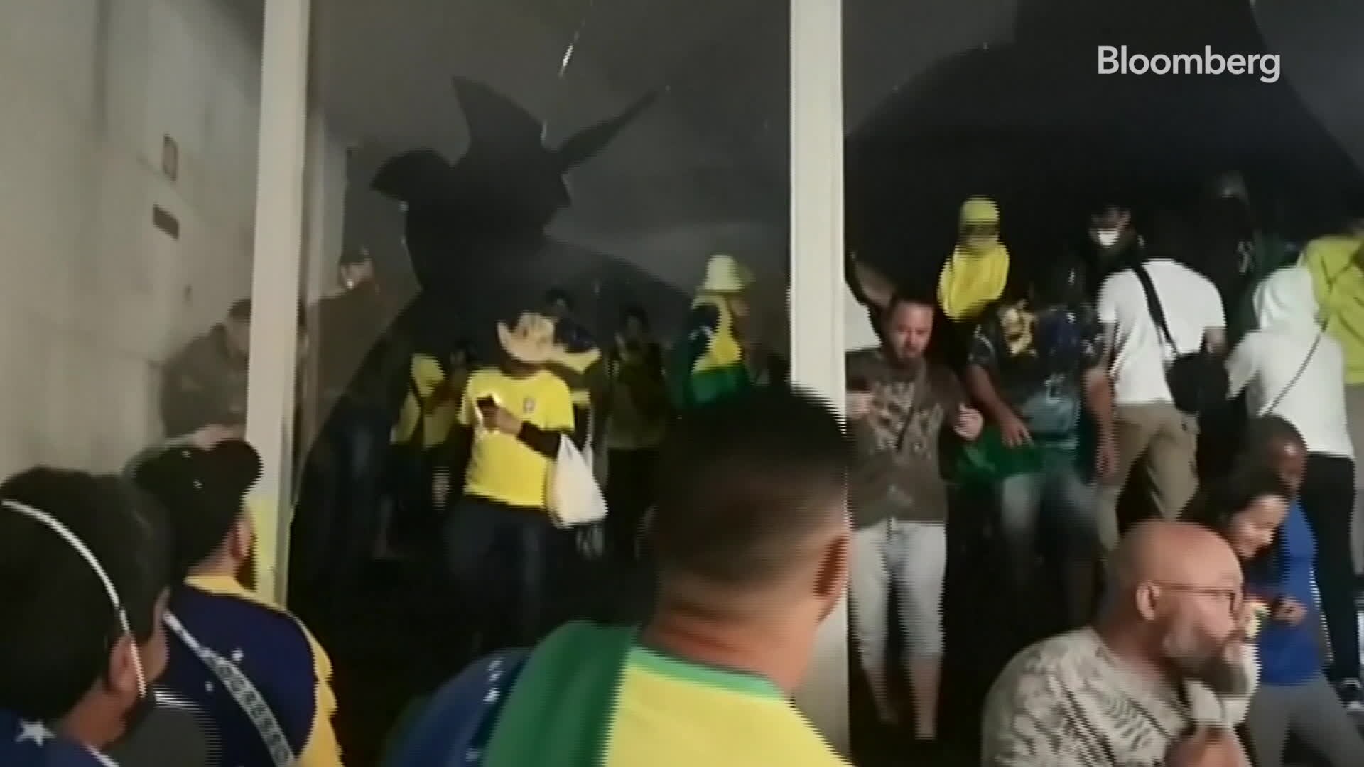 WATCH: Video shows thousands of supporters of former President Jair Bolsonaro storming Brazil's government buildings on Sunday.Source: APTN