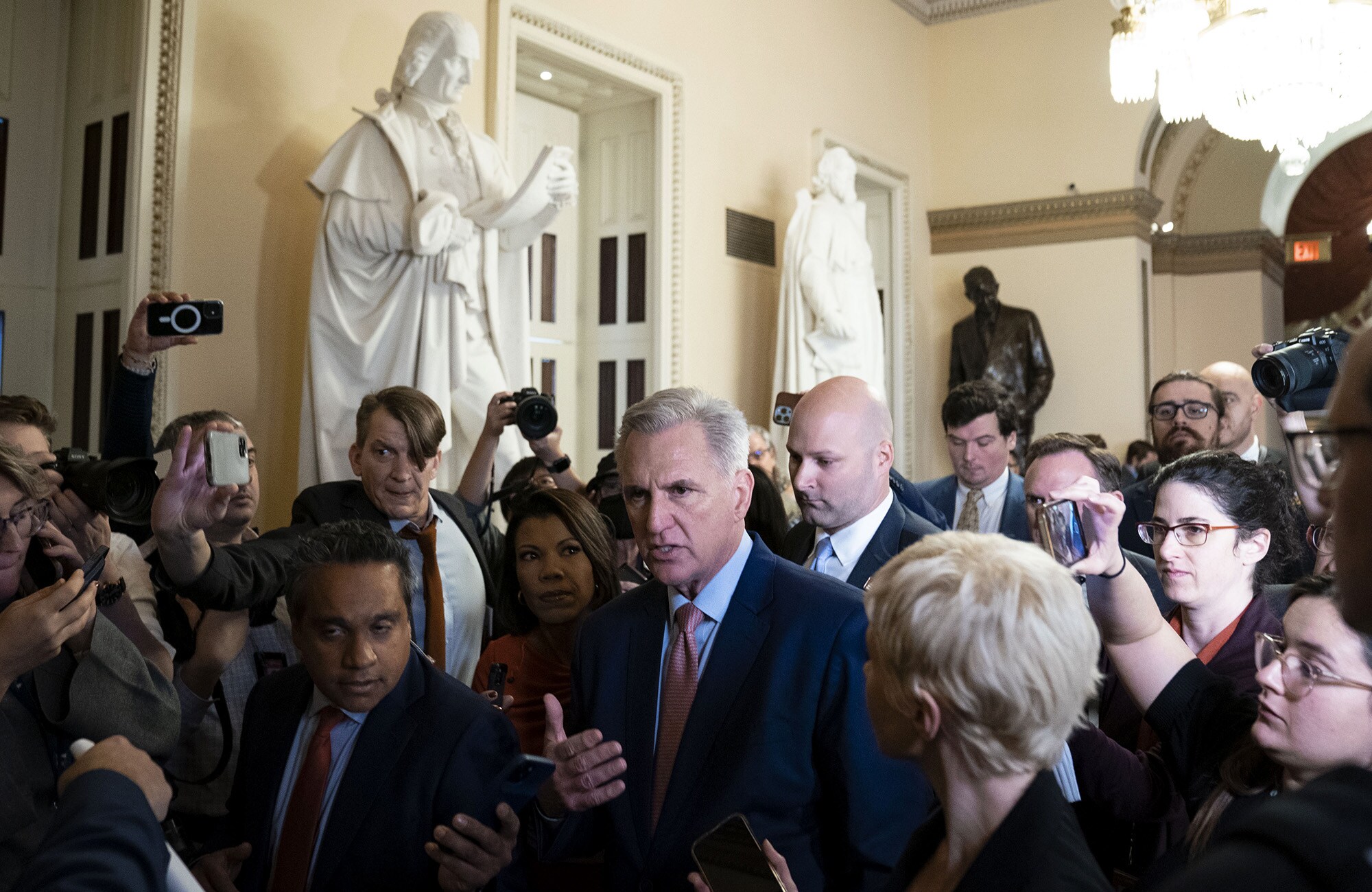 Kevin McCarthy, center, speaks to members of the media while walking to the House Chamber at the US Capitol in Washington, DC, on Jan. 3, 2023.Photographer: Sarah Silbiger/Bloomberg