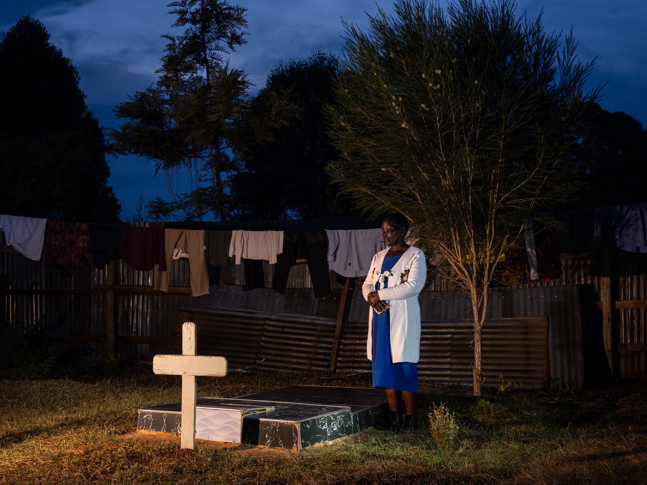 Dinah Tirop at her daughter's graveside.Photographer: Nichole Sobecki/Bloomberg