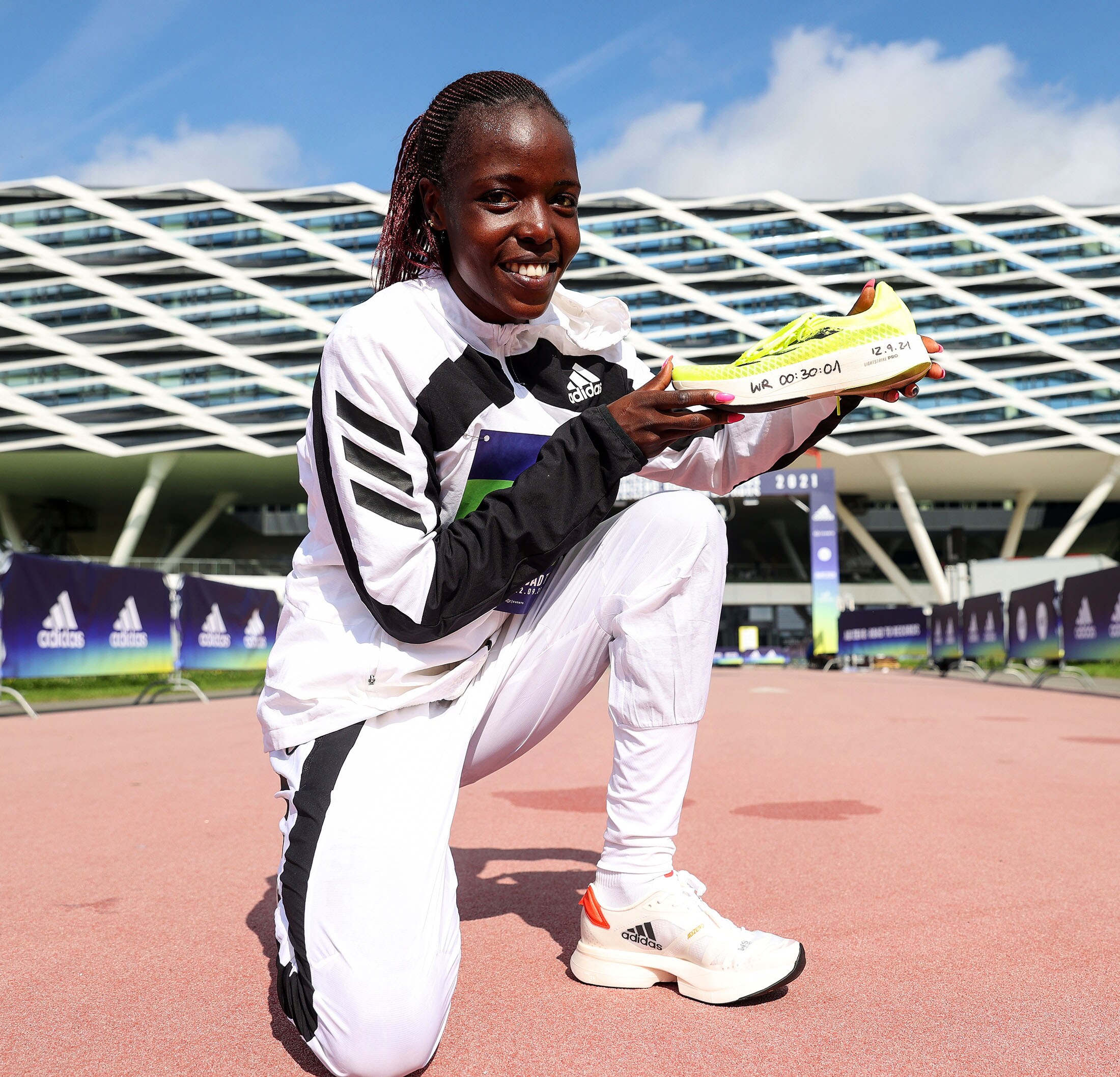 Tirop after setting a world record in the women-only 10-kilometer road race in Herzogenaurach, Germany, in September 2021, a month before her death.Photographer: Alexander Hassenstein/Getty Images