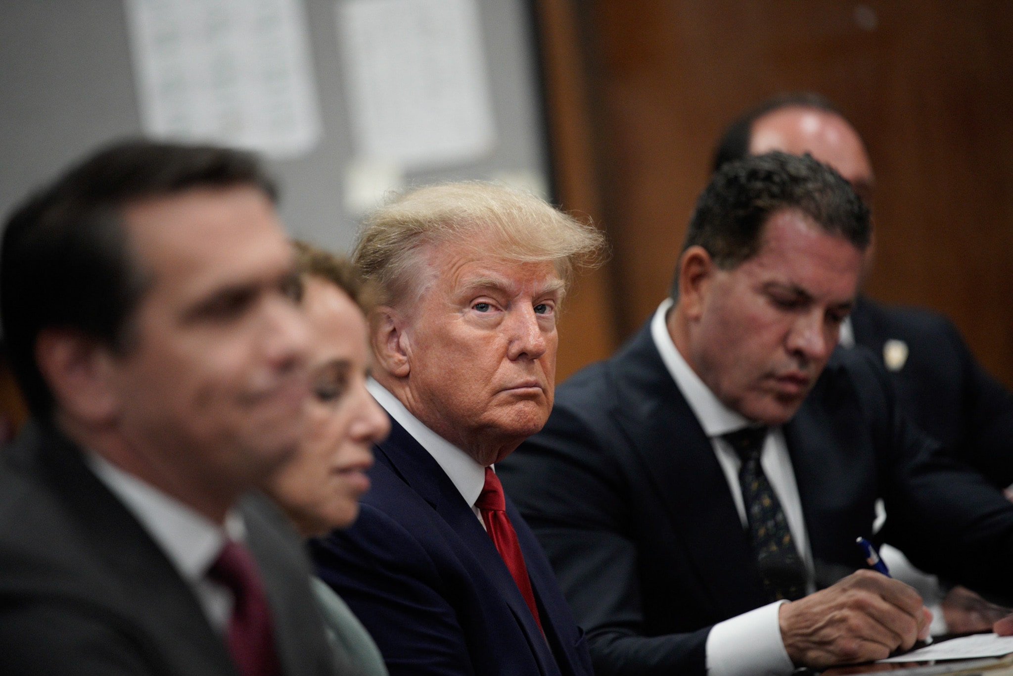Donald Trump with his defense team in court.Photographer: Curtis Means/DailyMail.com/Bloomberg