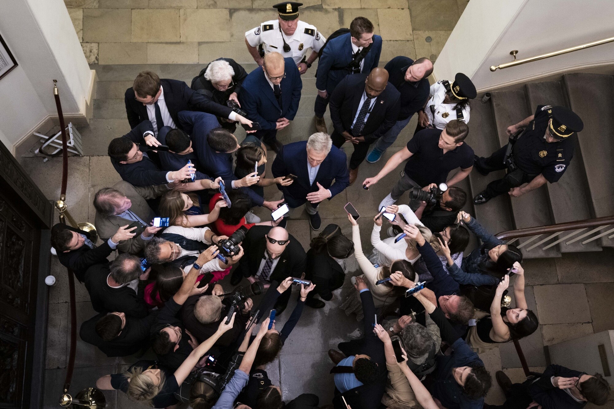 Kevin McCarthy, center, speaks to members of the media at the US Capitol on May 26.Photographer: Sarah Silbiger/Bloomberg