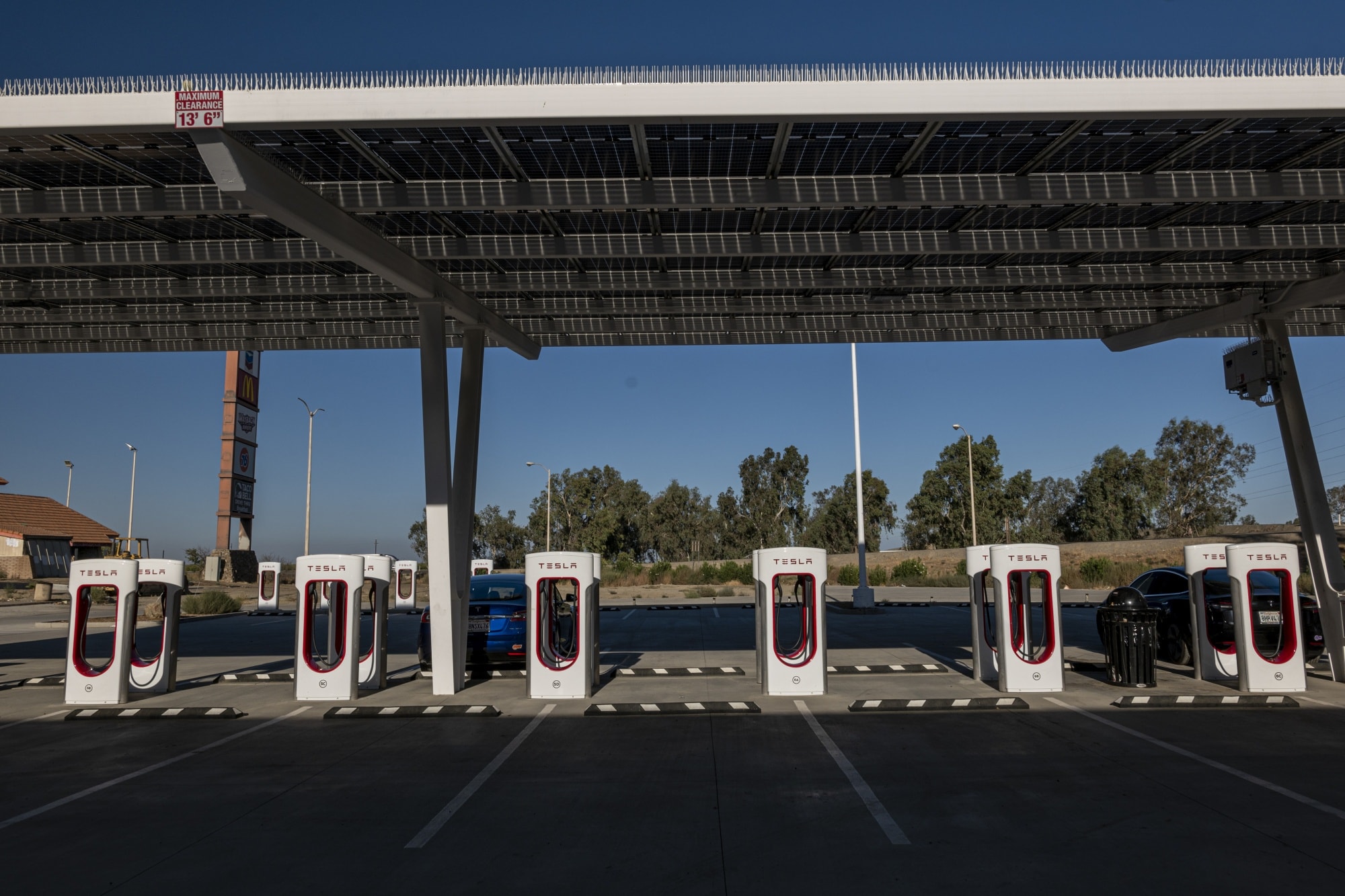 A Tesla Supercharger station in Firebaugh, California.Photographer: David Paul Morris/Bloomberg