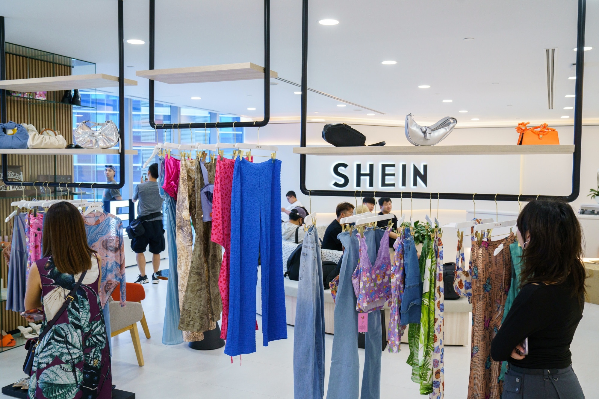 Clothes displayed at Shein's headquarters in Singapore.Photographer: Ore Huiying/Bloomberg
