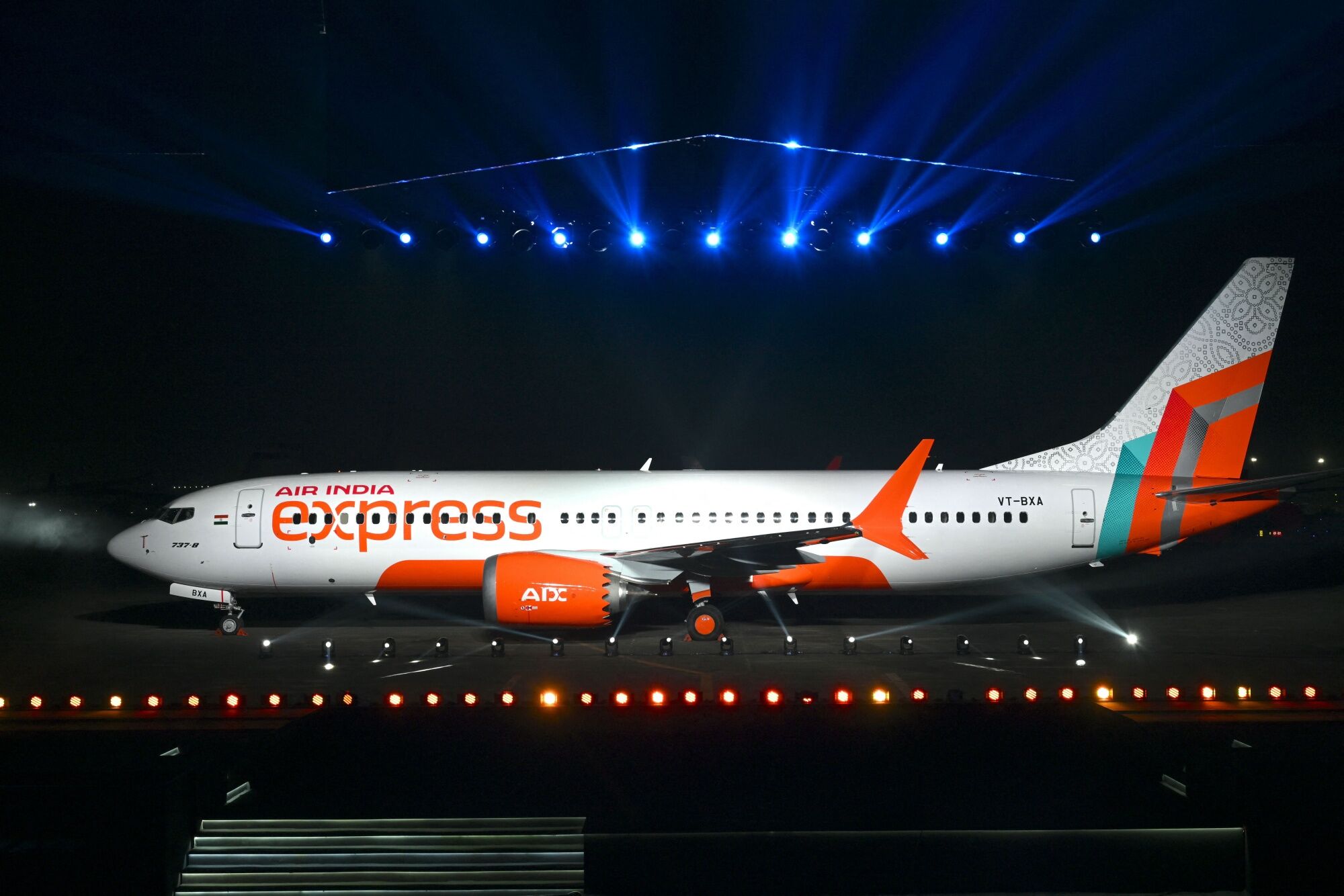 An Air India Express' Boeing 737 MAX passenger aircraft is seen during an event unveiling the airline's new brand identity at the Chhatrapati Shivaji Maharaj International Airport in Mumbai on October 18, 2023. Photographer: Indranil Mukherjee/AFP/Getty Images