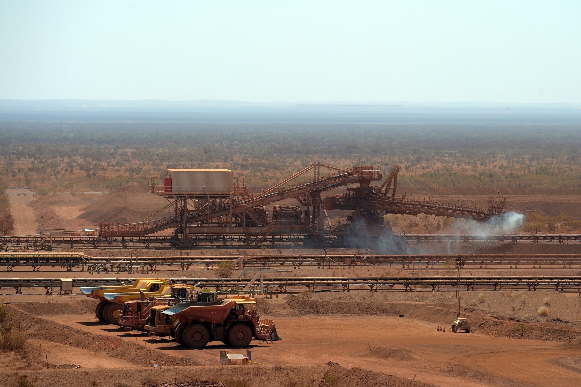 Water is sprayed over conveyor belts at Rio's Gudai-Darri mine in the Pilbara.Photographer: Carla Gottgens/Bloomberg