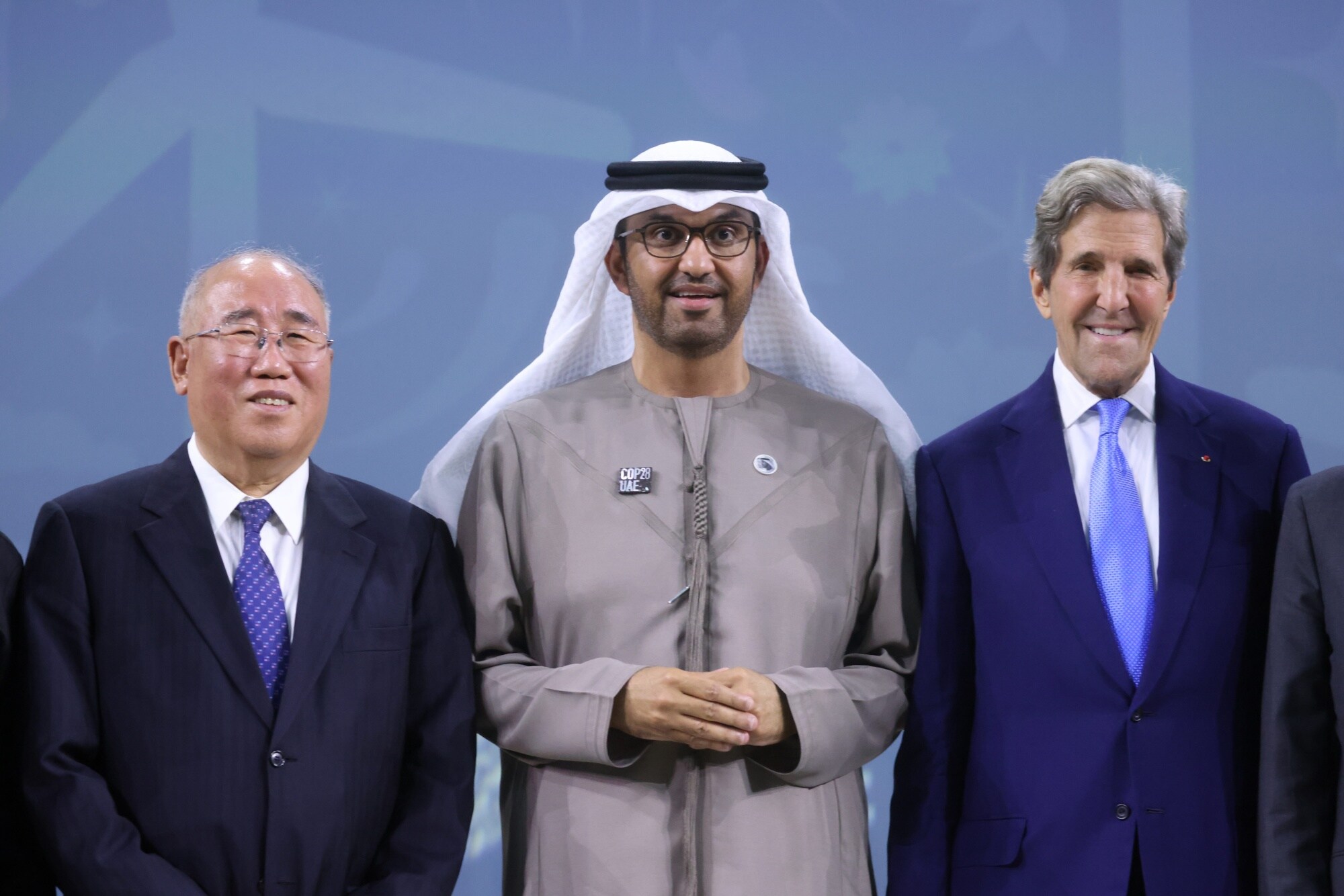 Xie Zhenhua, Sultan Ahmed Al Jaber and John Kerry at COP28.Photographer: Hollie Adams/Bloomberg