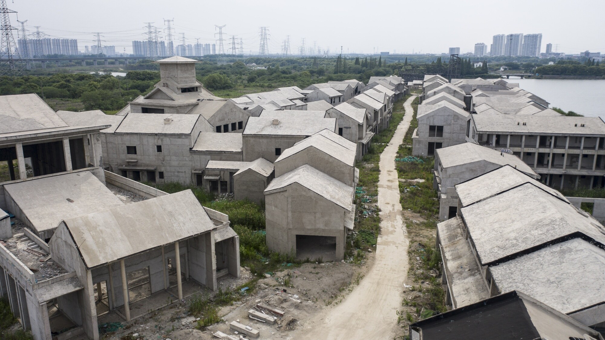 Unfinished buildings, abandoned part way through construction, in Wuxi in May 2023.Photographer: Qilai Shen/Bloomberg