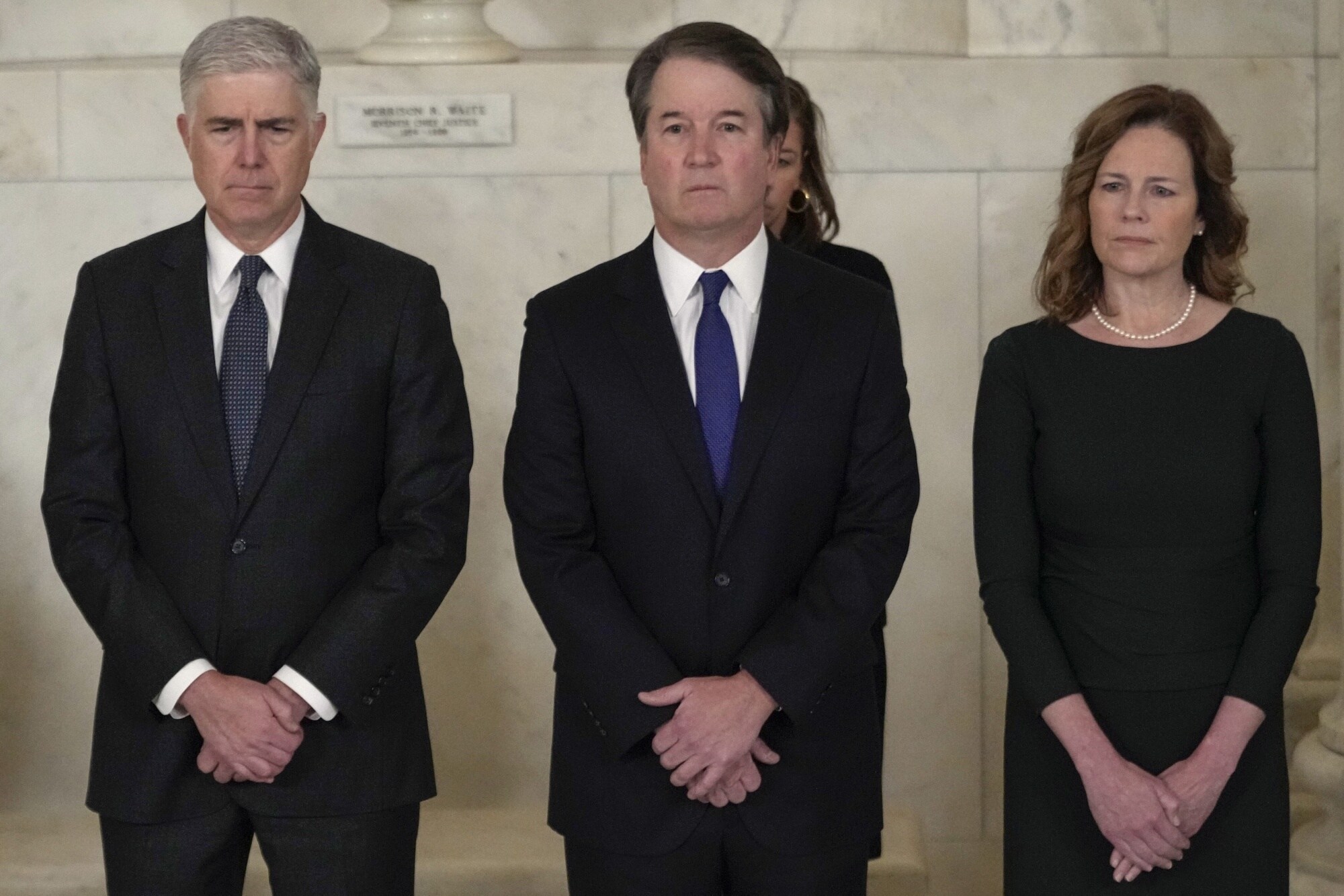 Neil Gorsuch, Brett Kavanaugh, and Amy Coney Barrett attend a private ceremony for Sandra Day O'Connor at the Supreme Court on Dec. 18.Photographer: Jacquelyn Martin/Getty Images