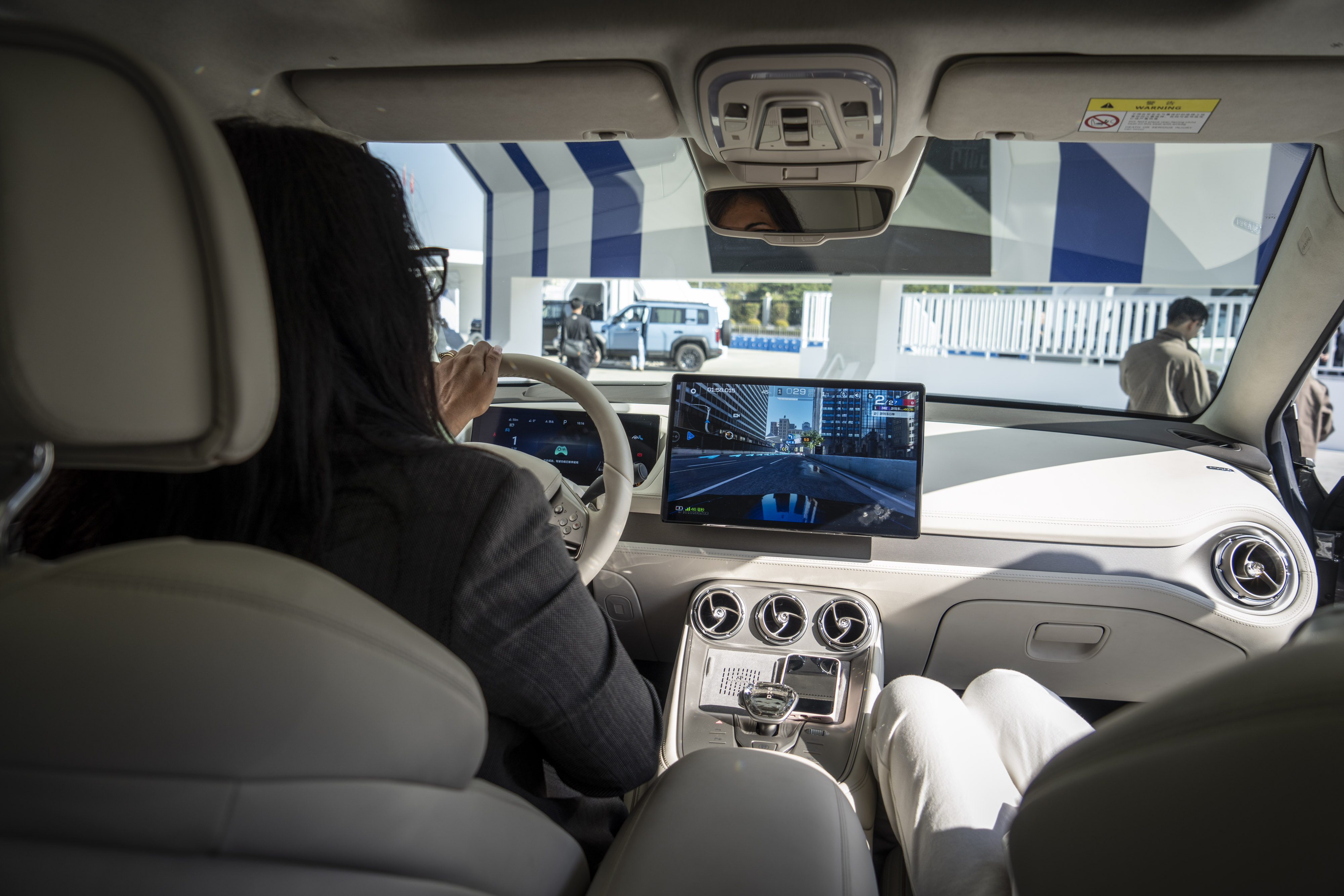 Chinese Cars Inside China EV Makers Woo Buyers With In-Car Beds, Kitchens and Drones