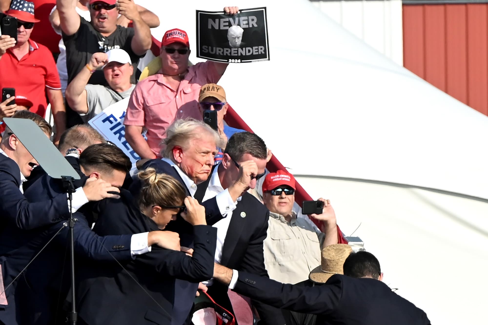Donald Trump is surrounded by Secret Service agents during a campaign event at Butler Farm Show Inc. in Butler, Pennsylvania, US, on July 13.Photographer: Joe Appel/Bloomberg