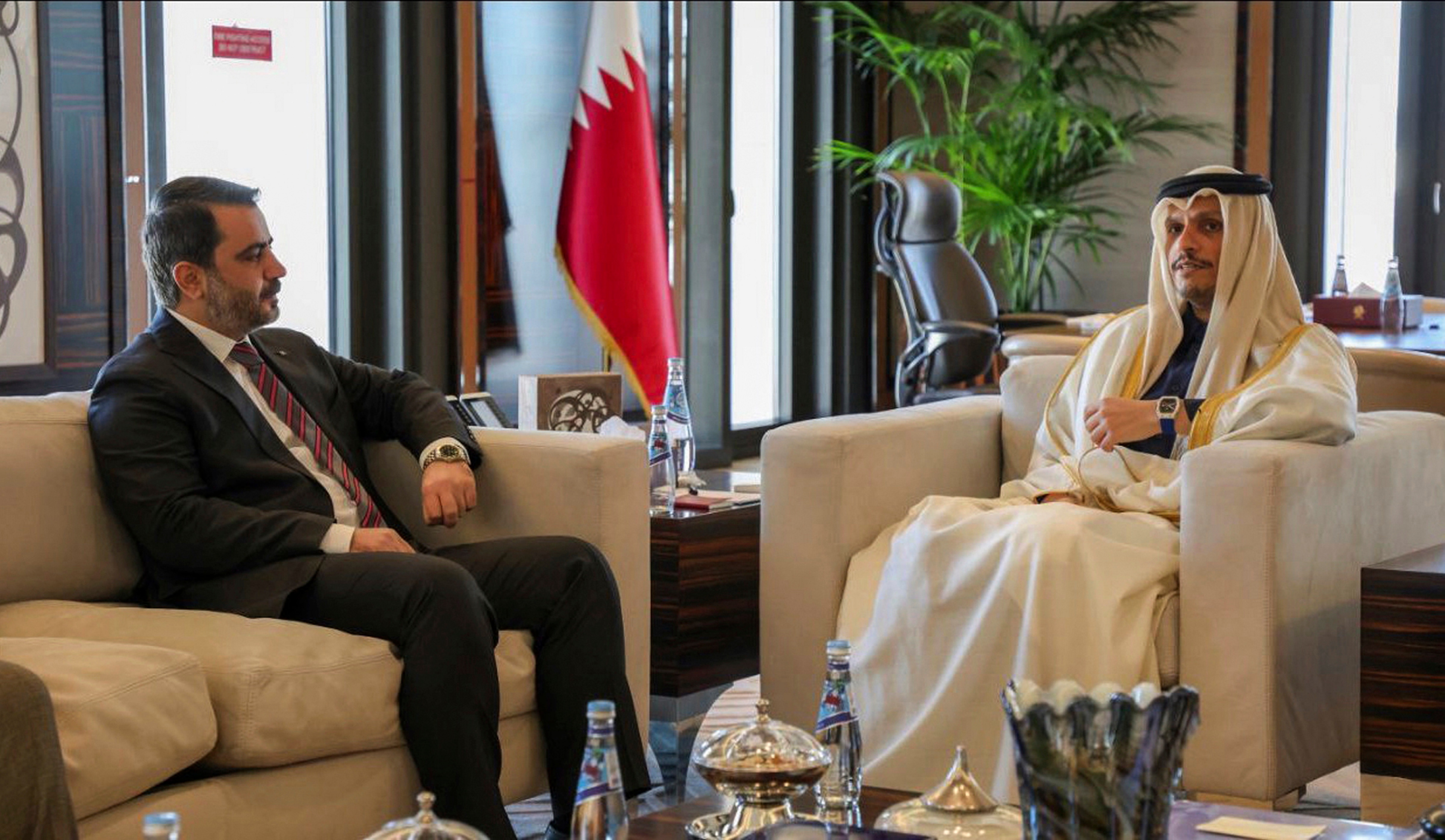 This photo released by the Syrian official news agency SANA, shows Syrian Foreign Minister Asaad al-Shibani, left, meeting with Qatari Prime Minister and Foreign Minister Mohammed bin Abdulrahman Al Thani, in Doha, Qatar, on Jan. 5, 2025. (Photo source: AP/PTI)