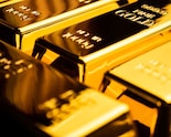 Gold Slips Into Bear Market, But Bulls Still Eye $10,000 Target
