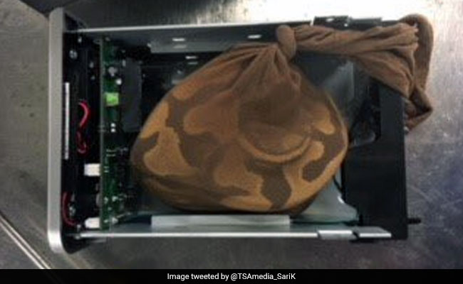 Man Tried To Bring Python On Plane By Hiding It In computer Hard Drive