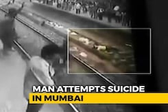 Man Lay On Rail Track In Mumbai. Dramatic Rescue Recorded On CCTV Man Lay On Rail Track In Mumbai. Dramatic Rescue Recorded On CCTV