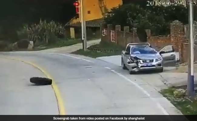 Runaway Tires Crash Into Car With Driver Still Inside. He Escapes Unhurt