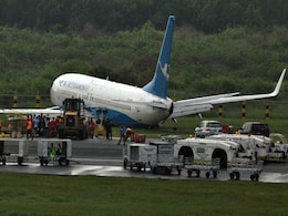 Passenger Plane Slides Off Runway In Heavy Rain Passenger Plane Slides Off Runway In Heavy Rain