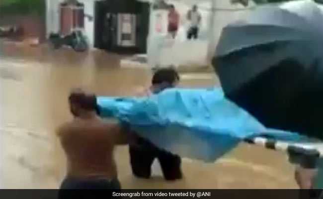 No Ambulance, Pregnant Woman Carried On Cot Through Flooded Streets