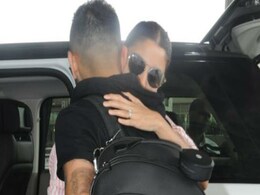 Anushka Sharma And Virat Kohli Share A Warm Hug At The Airport. Pics Are Viral Anushka Sharma And Virat Kohli Share A Warm Hug At The Airport. Pics Are Viral
