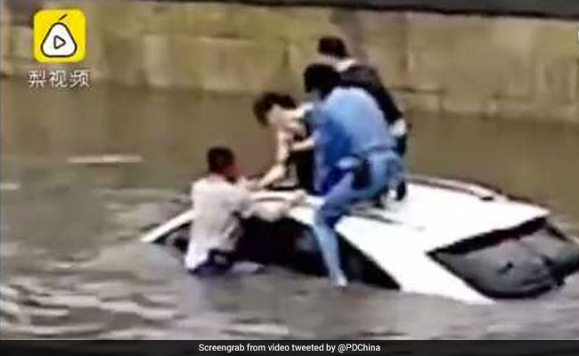 She Was Trapped Inside Sinking SUV. Strangers Came Together To Rescue Her