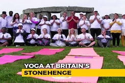 Yoga Lovers Meet At Britain's Stonehenge, Greet Rising Sun, Perform <i>Asanas</i> Yoga Lovers Meet At Britain's Stonehenge, Greet Rising Sun, Perform <i>Asanas</i>